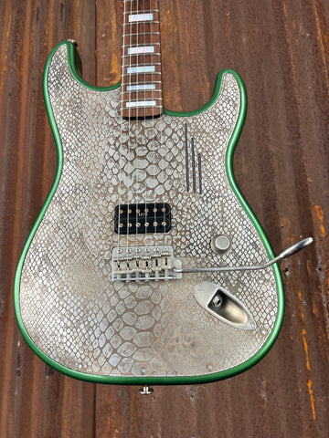 23049 Cadillac Green Snakeskin Steel O Matic
