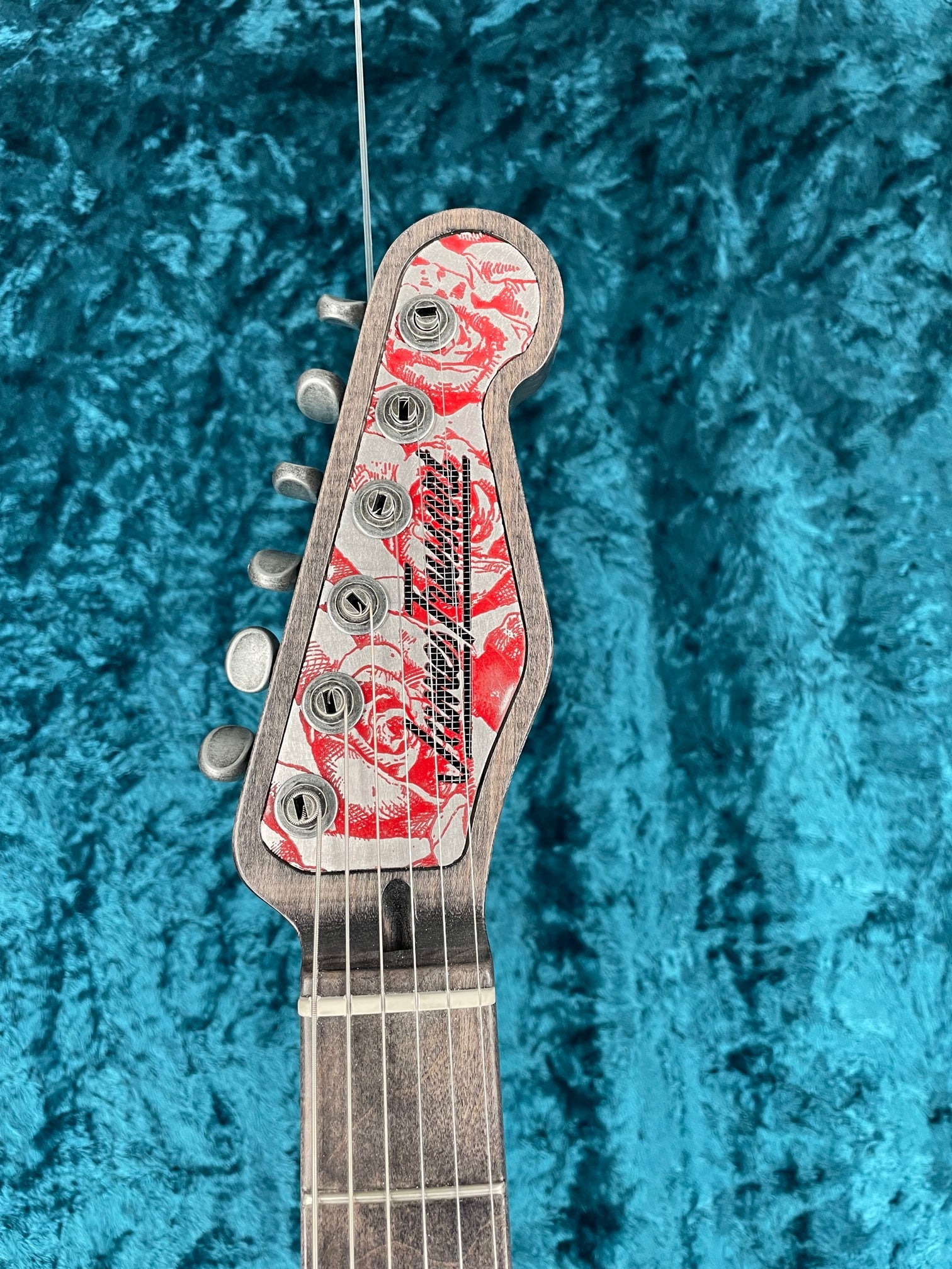23002 Red on Steel Roses SteelGuard O Matic