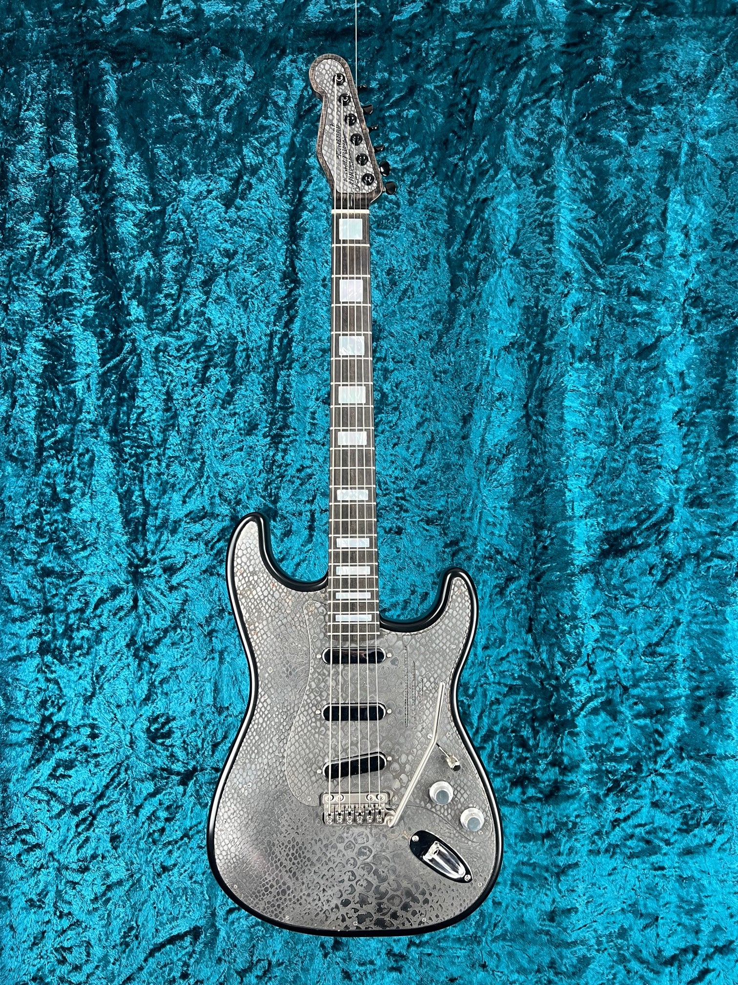 23009 Recessed Snakeskin Engraved Steel O Matic