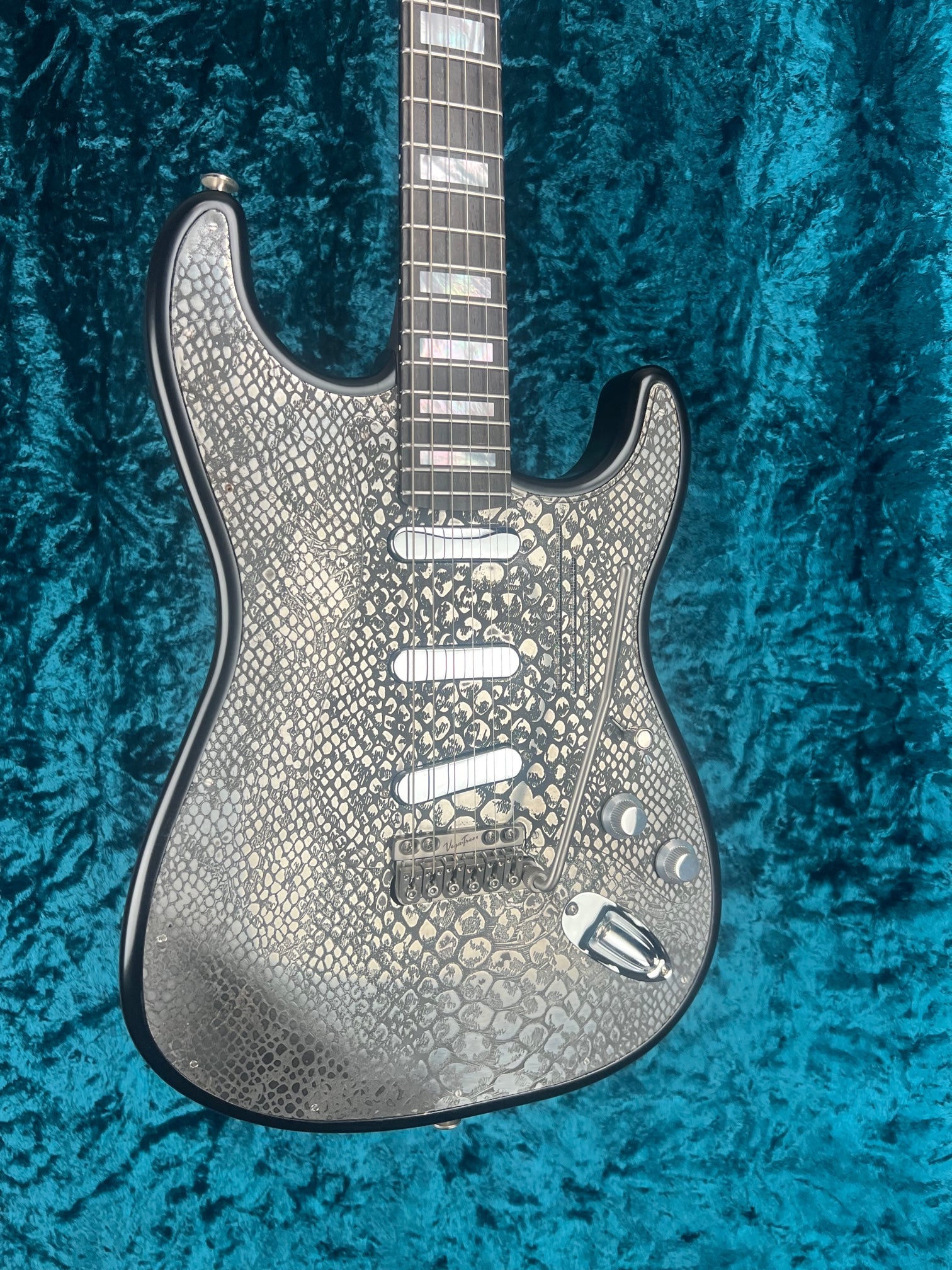 23009 Recessed Snakeskin Engraved Steel O Matic