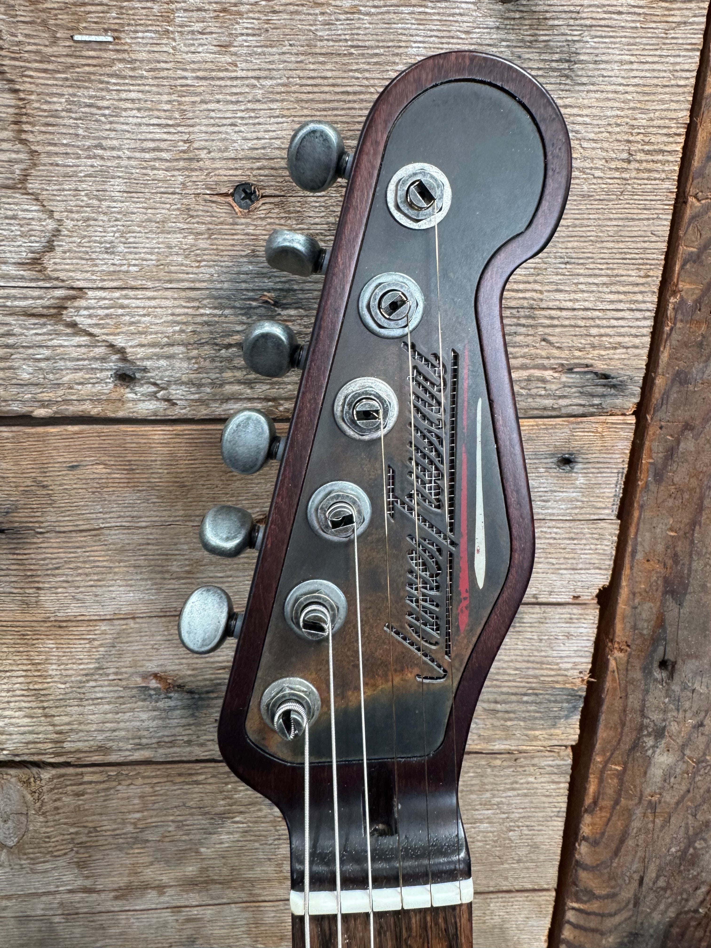 25023 Rusty Pinstriped Steelcaster 