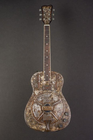 16090 Rust On Cream Paisley SteelReso