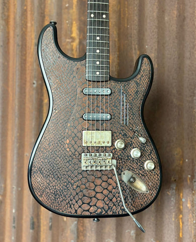 25010 Rusty Snakeskin Engraved Steel O Matic